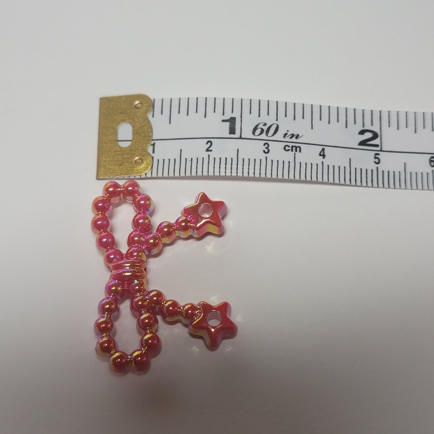 Acrylic bow beads with charm holes, iridescent mix of colors