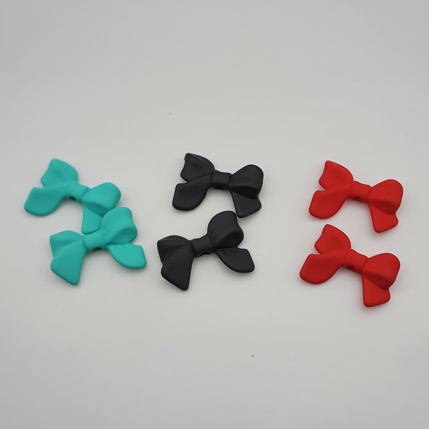 Acrylic silicone touch bow beads