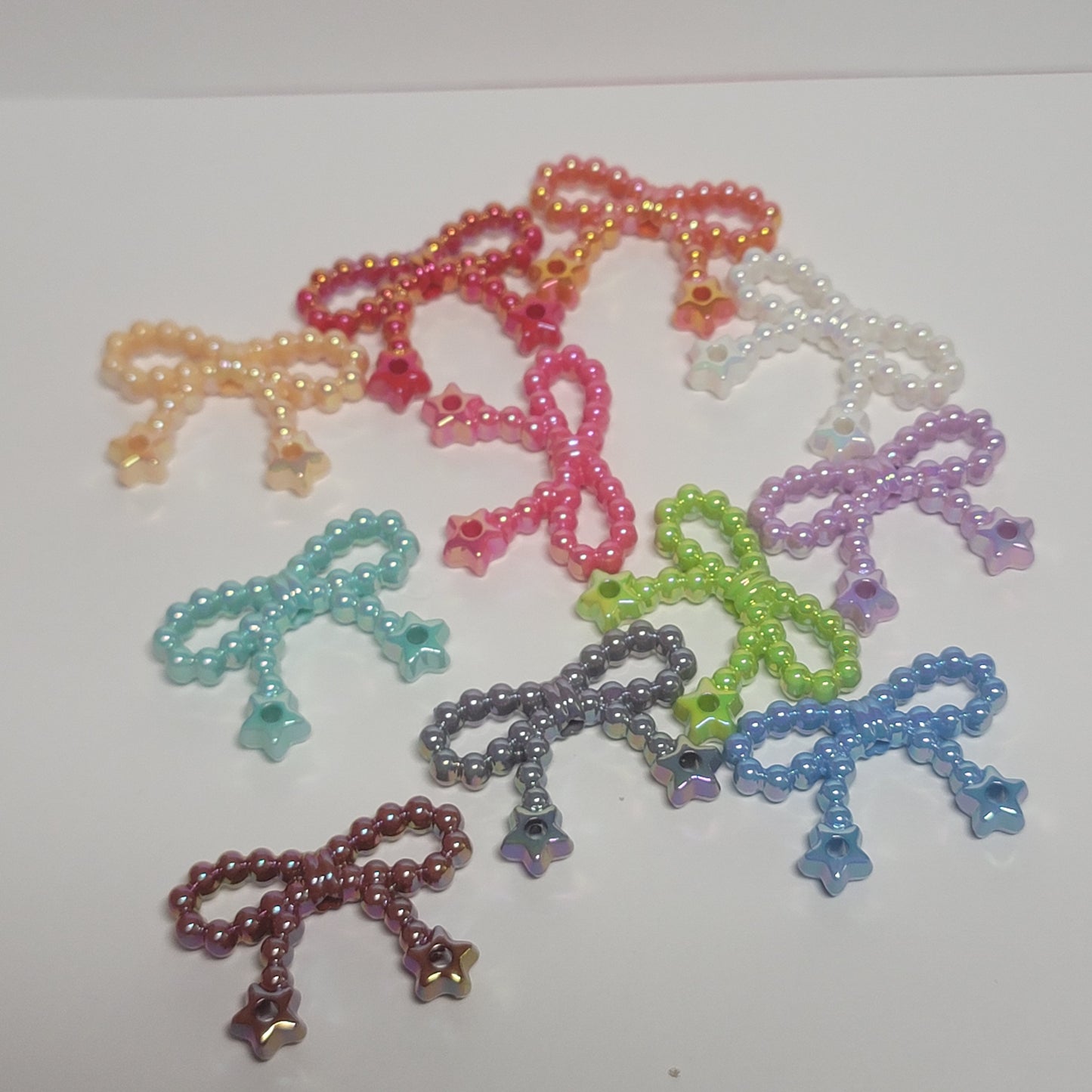 Acrylic bow beads with charm holes, iridescent mix of colors